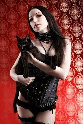 8385613-beautiful-sexy-woman-in-black-lingerie-holding-black-cat-over-vintage-background.jpg